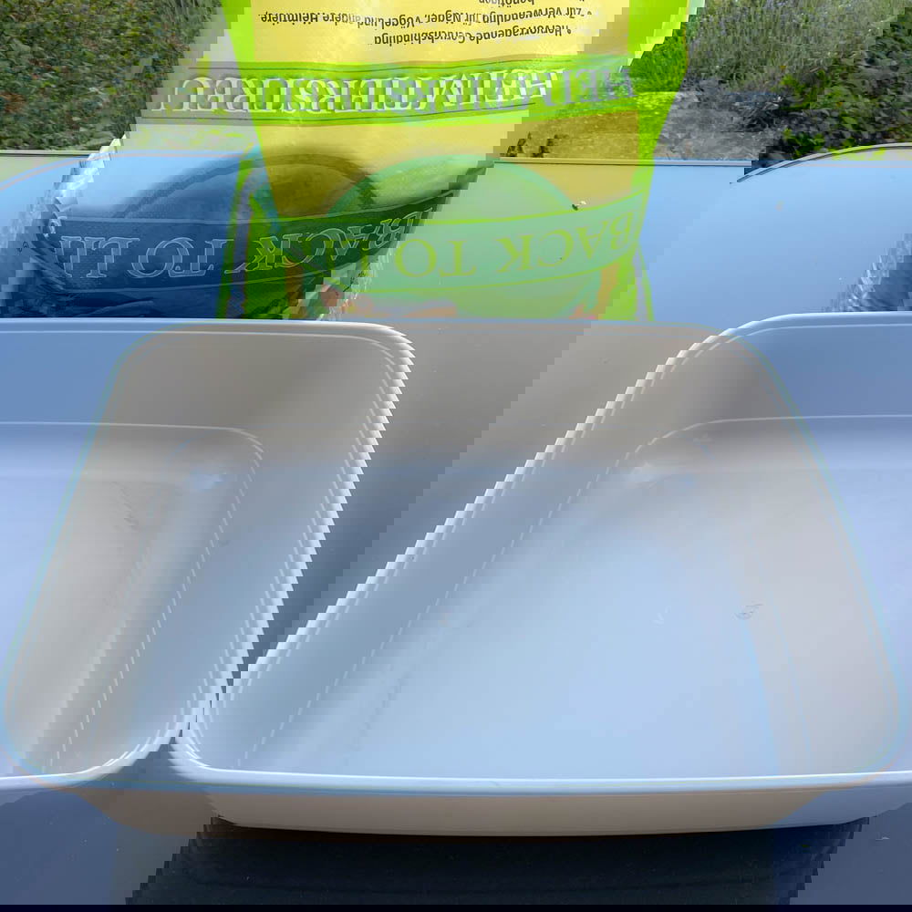Nettoyage de la litière au vinaigre blanc
